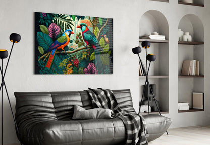Vibrant glass wall art depicting two colorful parrots among tropical foliage and flowers displayed above a black leather sofa in a modern living room.