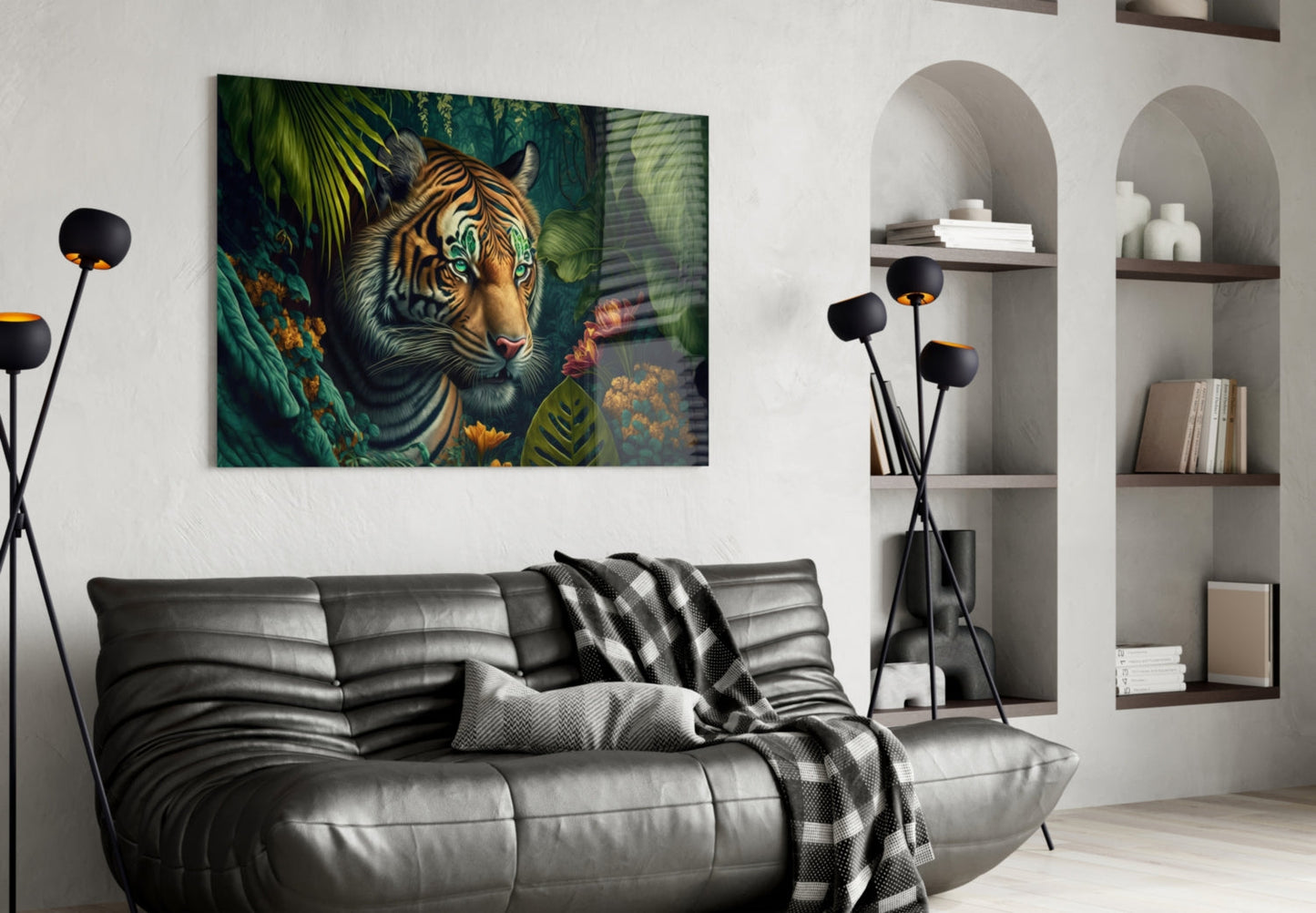 Tiger with green foliage and flowers displayed as framed glass art above grey leather sofa in modern living room.