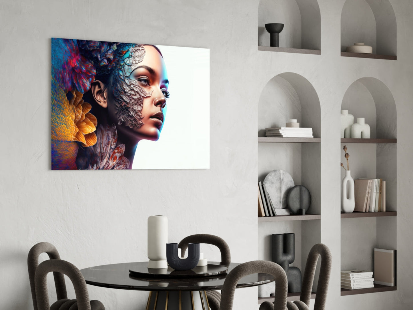 Colorful glass wall art depicting a woman's profile with vibrant blue, red, and gold textured overlay, displayed above a black dining table in a modern interior setting.