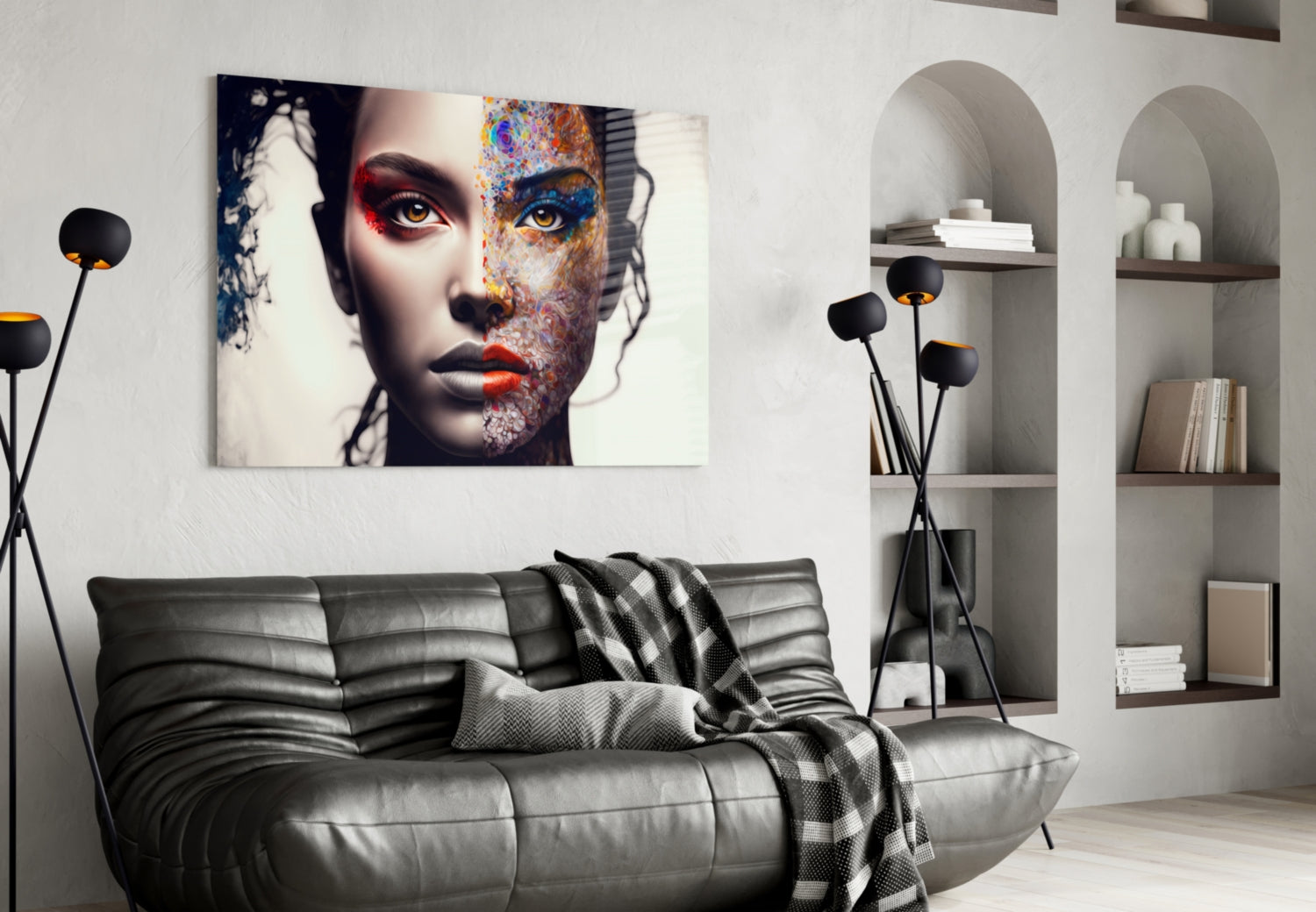 Modern living room interior featuring an abstract portrait glass wall art above a gray leather sofa, displaying colorful artistic face design with vibrant blue, red, and orange elements.