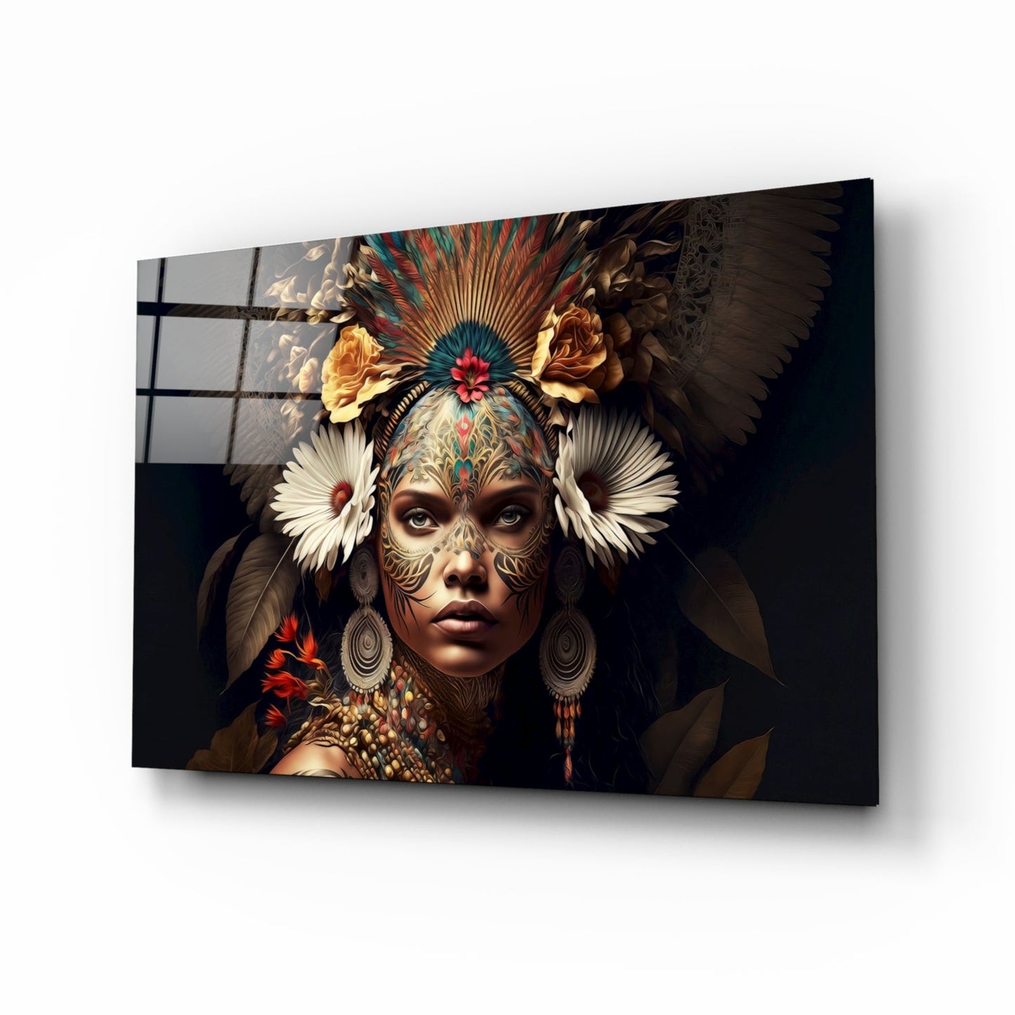 Angled view of glass wall art featuring an ornately decorated woman's face with intricate patterns, colorful feathered headdress, and dark background.