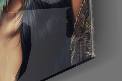 Close-up angled view of glass wall art showing detailed feather design with gold and black tones on translucent surface.
