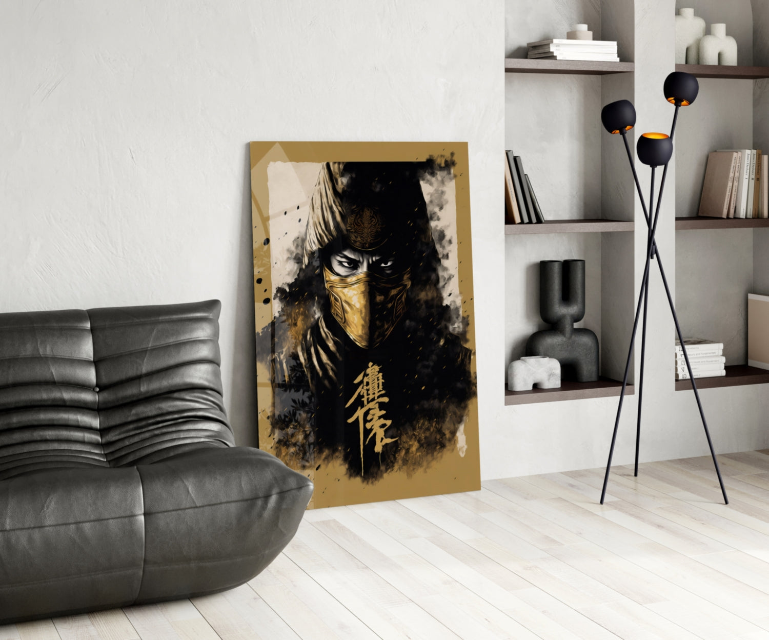 Gold and black glass wall art featuring a masked warrior with Asian characters, displayed in a modern living room with gray sofa and shelving.