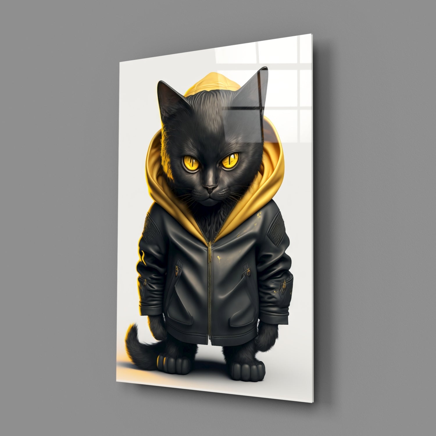 Black cat wearing gold-trimmed black hoodie with yellow eyes, displayed on angled glass panel against gray background.