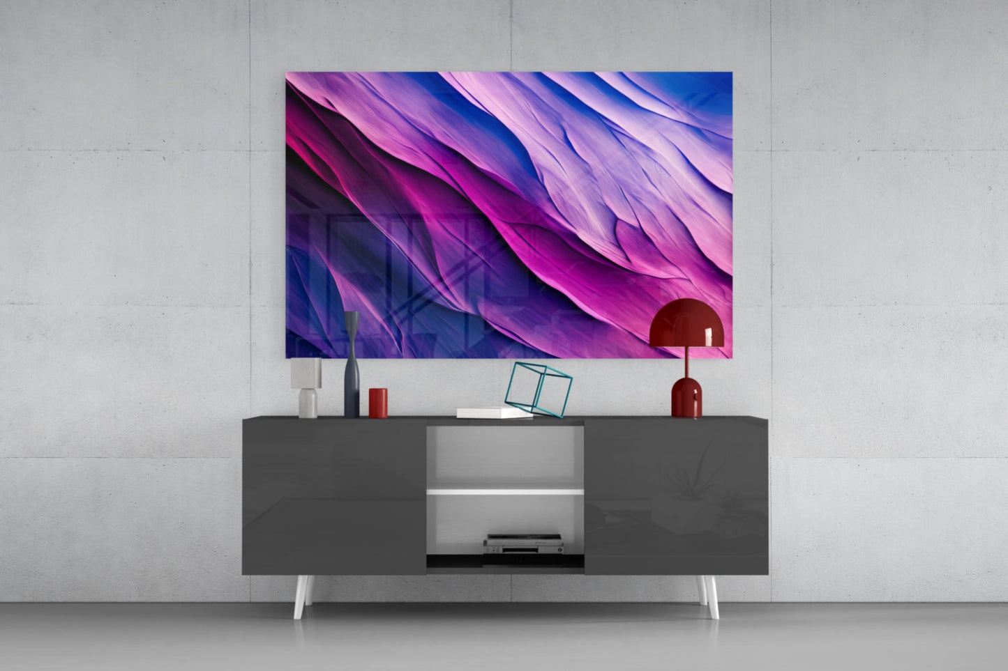 Purple Dance glass wall art featuring flowing magenta and blue gradient waves displayed above a modern dark console table with white legs.