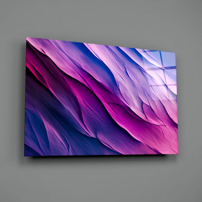 Purple Dance Glass Wall Art mounted on gray wall, displaying diagonal flowing waves in magenta, purple, and blue gradient tones.