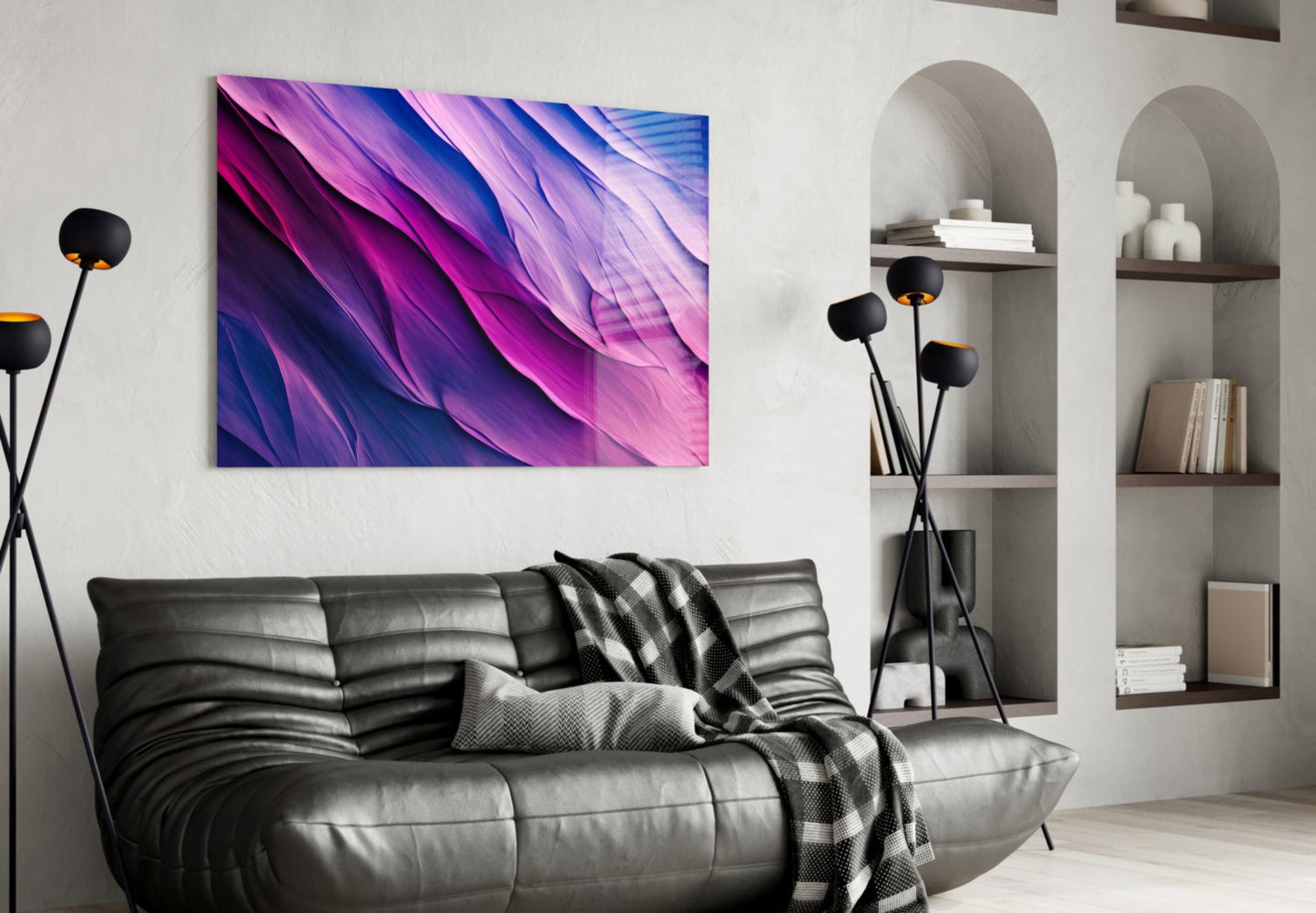 Purple Dance glass wall art with blue and magenta flowing wave pattern displayed above black leather sofa in modern living room.