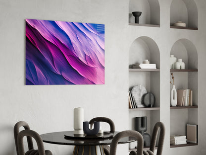 Purple and blue gradient glass wall art with swirling brushstroke design hanging above round black dining table with gray chairs.