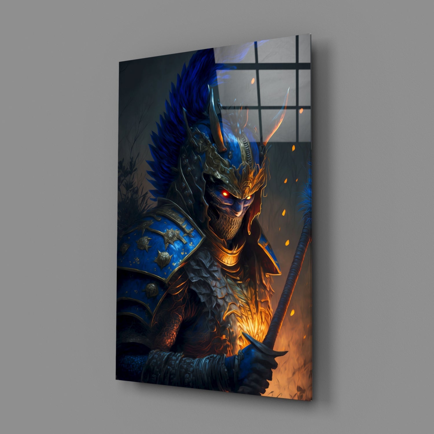 Angled view of a glass wall art panel displaying a warrior with glowing red eyes, blue spiky hair, ornate armor, and orange flame effects against dark background.