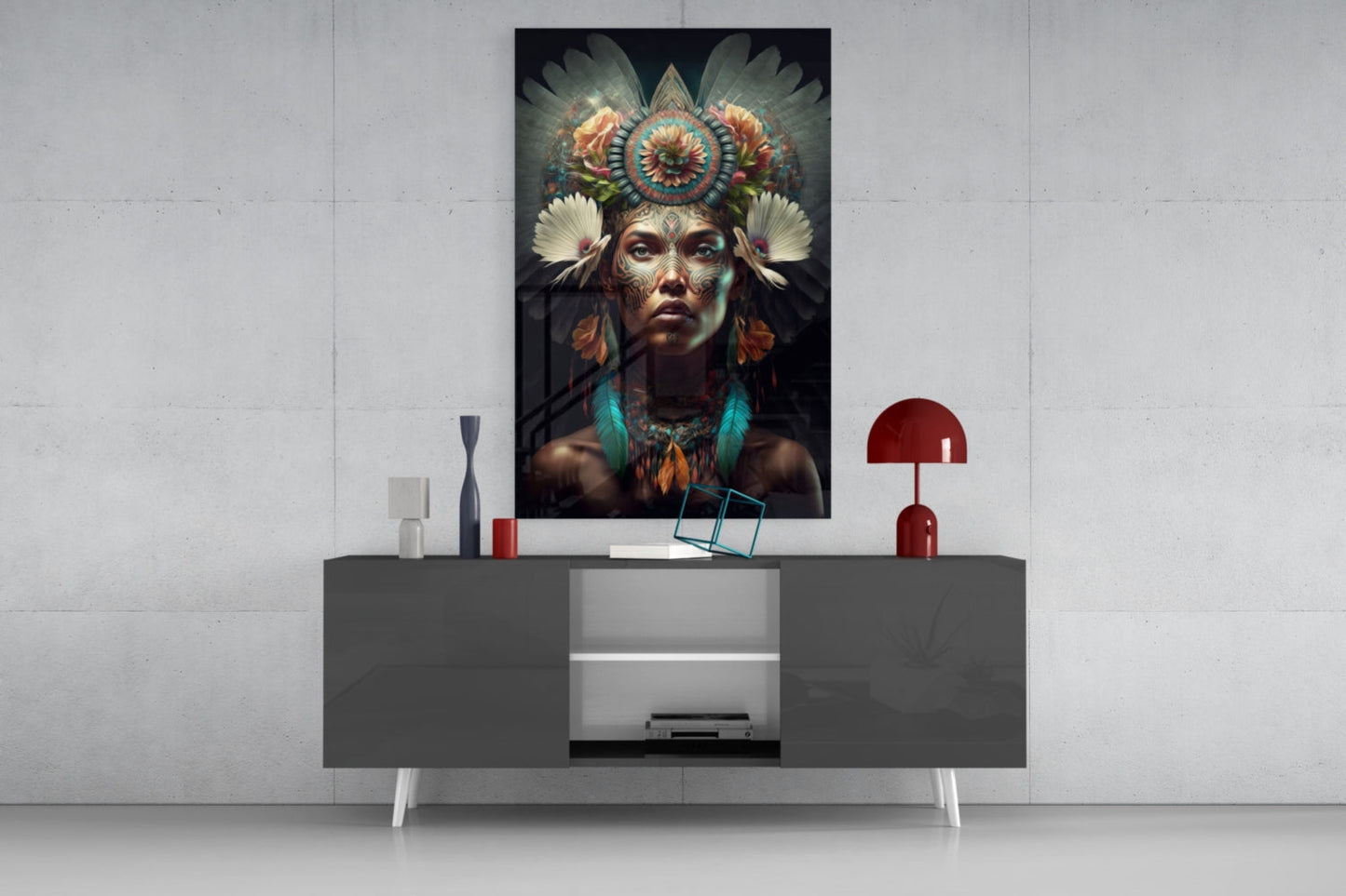 Flower Monarch glass wall art displayed above gray media console, showing indigenous-inspired portrait with ornate feathered headdress in turquoise, coral, and cream tones.
