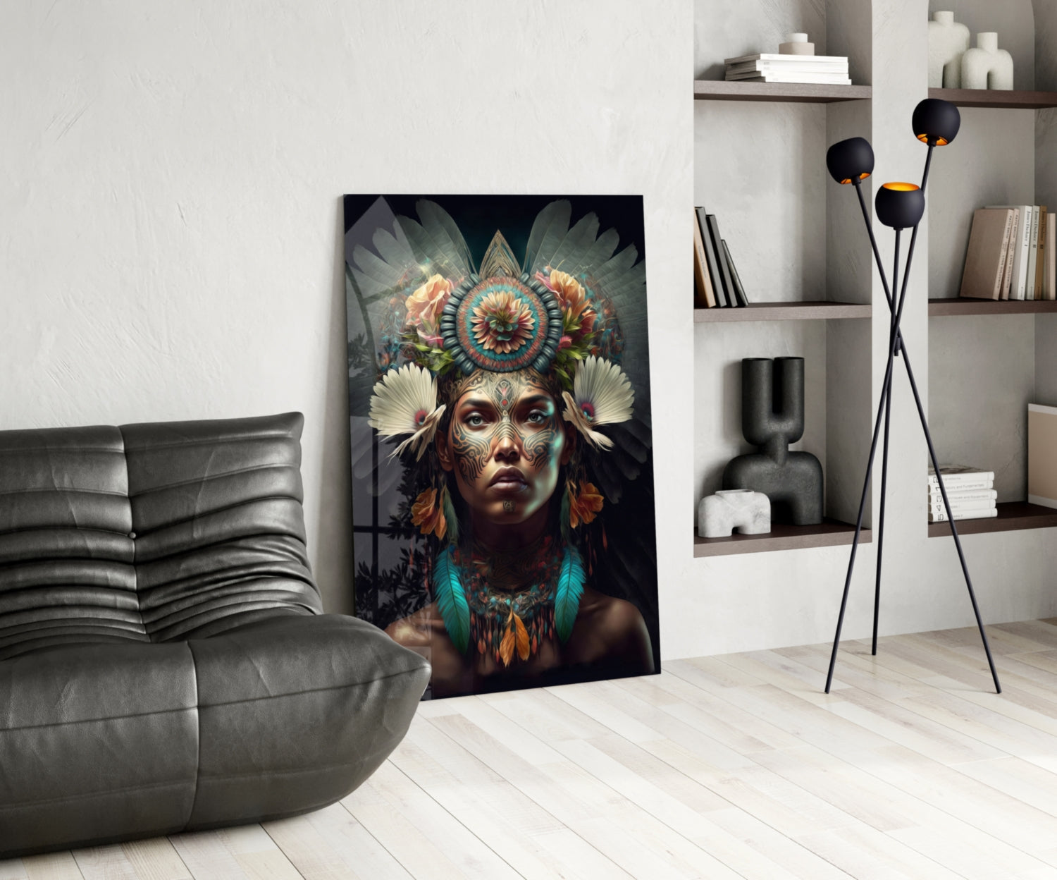 Glass wall art depicting a woman with ornate headdress, feathered wings, and colorful face painting displayed in modern living room setting.