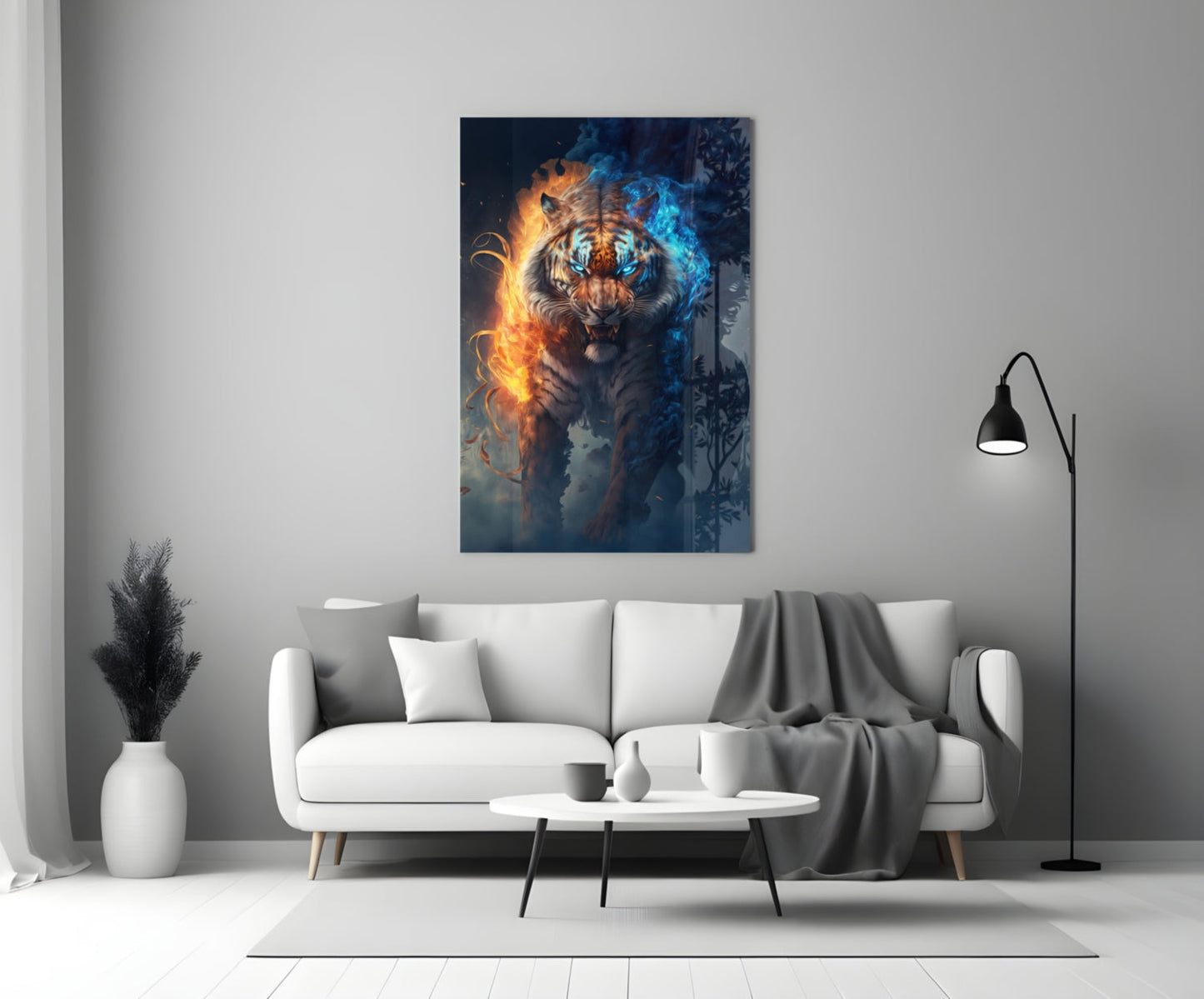 A fierce tiger surrounded by orange flames on the left and blue ice on the right hangs above a white sofa in a minimalist living room.