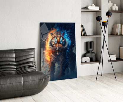 Modern living room displaying glass wall art of a tiger with orange flames on left side and blue ice on right side, leaning against white wall next to gray leather chair.