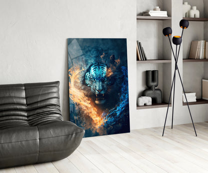 Glass wall art featuring a tiger's face surrounded by blue and orange fire effects, displayed in a modern living room next to a gray sofa.