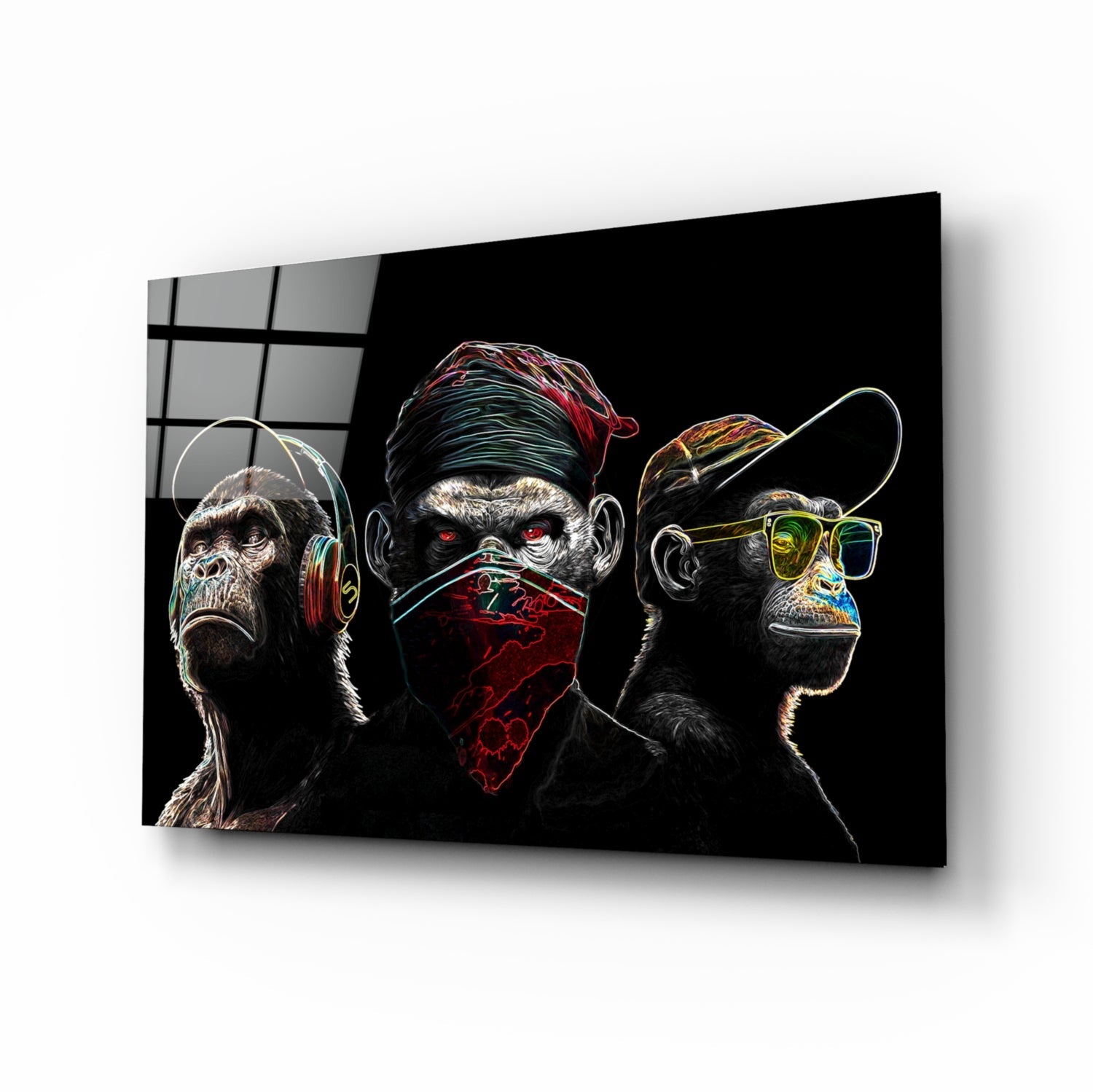 Three stylized monkeys with neon outlines on black glass displayed at an angle, showing headphones, bandana, and sunglasses.