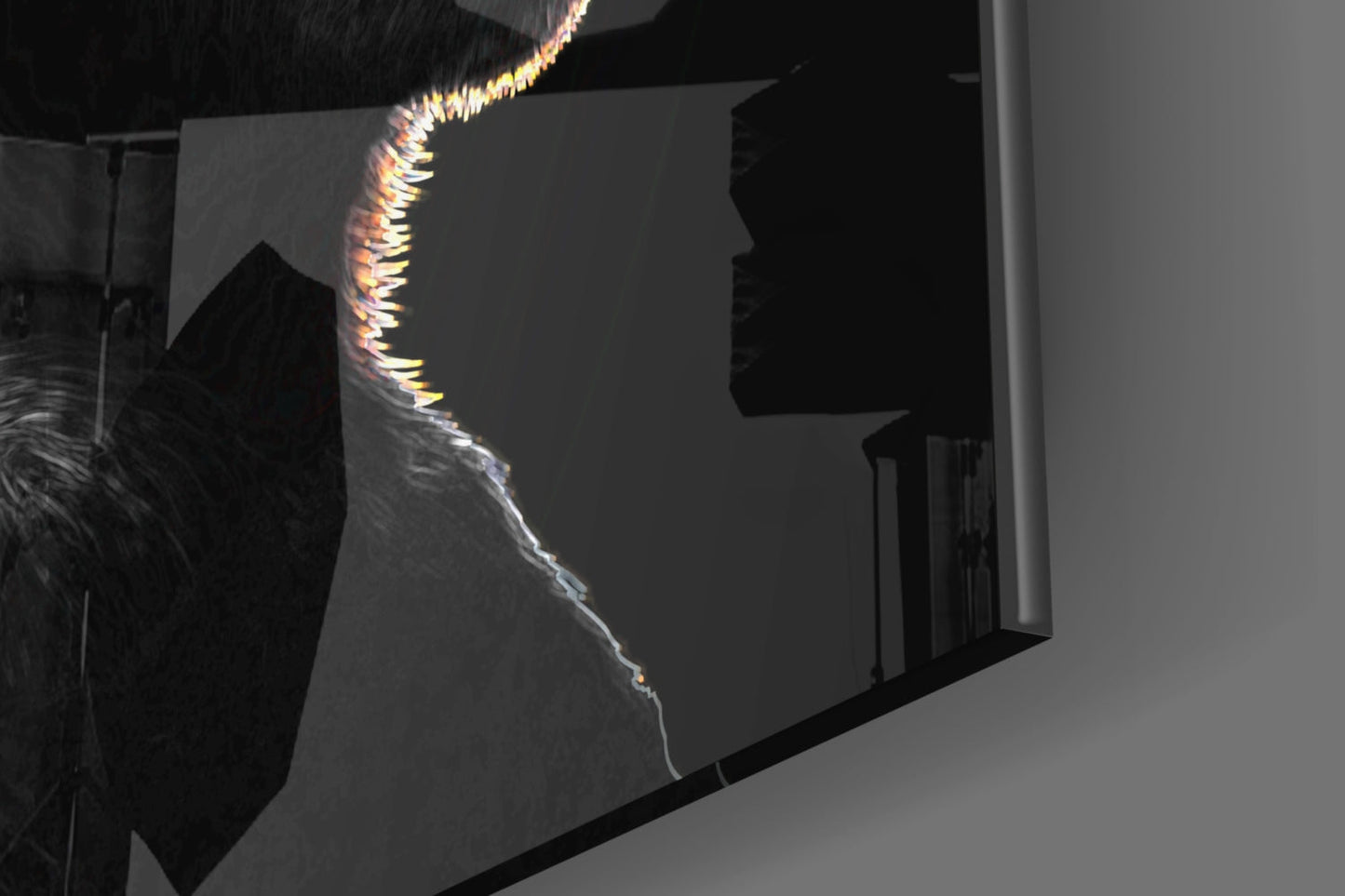 Neon glass wall art with illuminated yellow and orange lines forming a silhouette profile against dark background, mounted on wall.