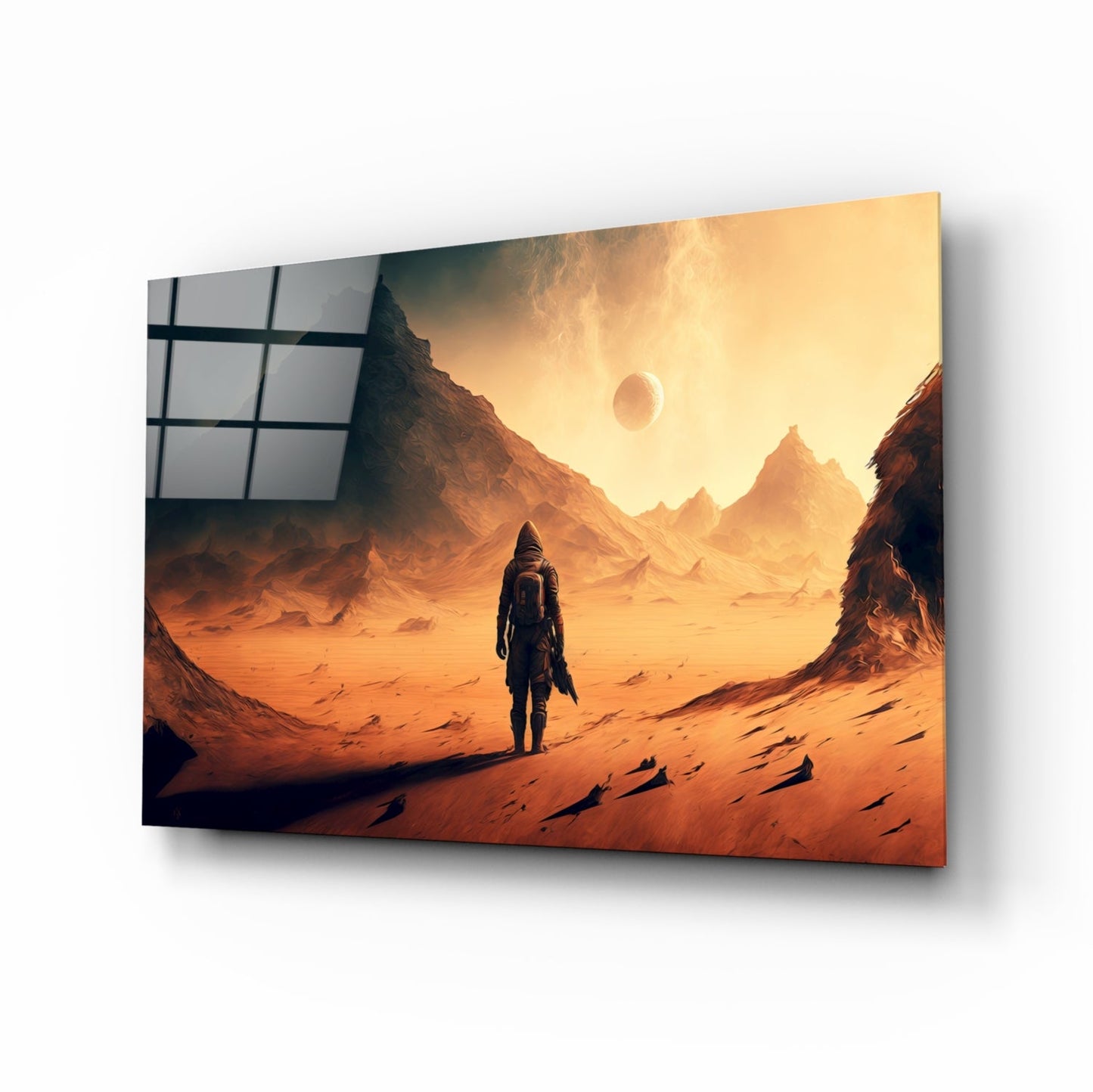 Glass wall art panel displaying a solitary astronaut in spacesuit standing on orange desert landscape with mountains and planet in sky.