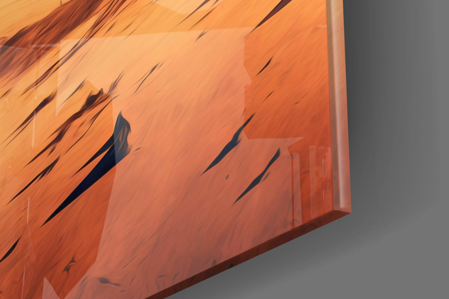 Close-up angled view of orange and red glass art panel with diagonal scratch texture details and gray wall background.