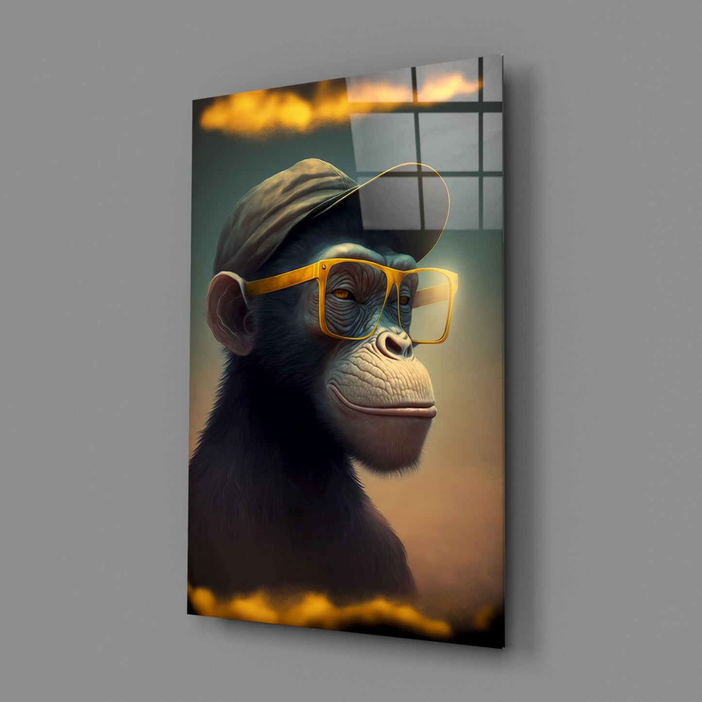 Angled view of glass wall art featuring a stylized chimpanzee wearing oversized yellow-framed sunglasses and a baseball cap against a warm golden-brown background.