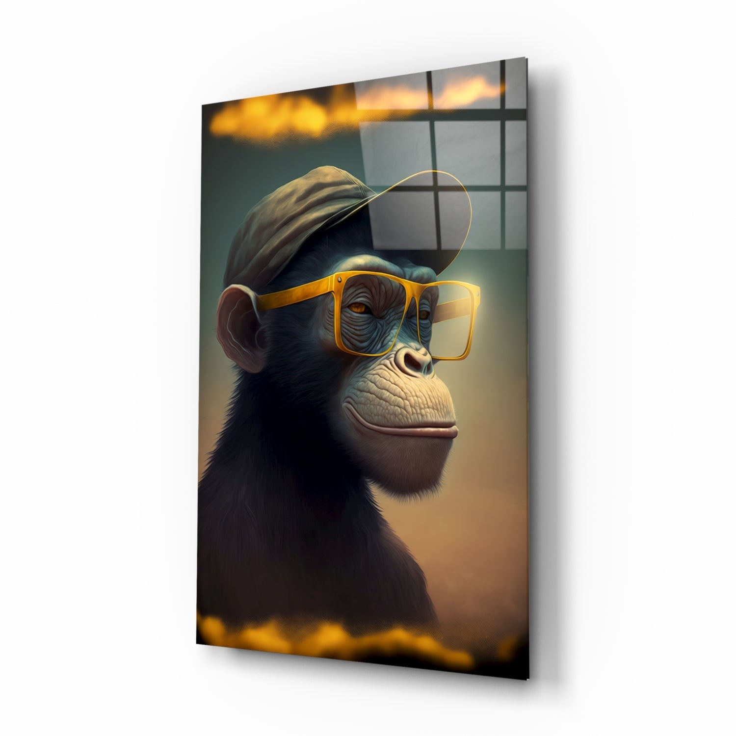 Three-quarter view of glass wall art featuring a stylized chimpanzee wearing oversized yellow-framed sunglasses and a gray cap against a warm golden-brown background.