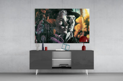 Vintage-style glass wall art depicting two figures among dark foliage displayed above a modern gray media console with red decorative accents.