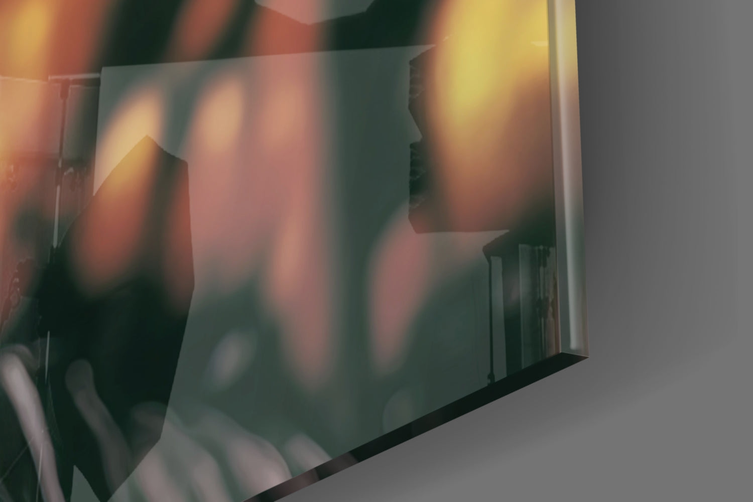 Translucent glass wall art panel with warm amber and coral tones casting soft shadows, angled side view showing depth and light refraction.