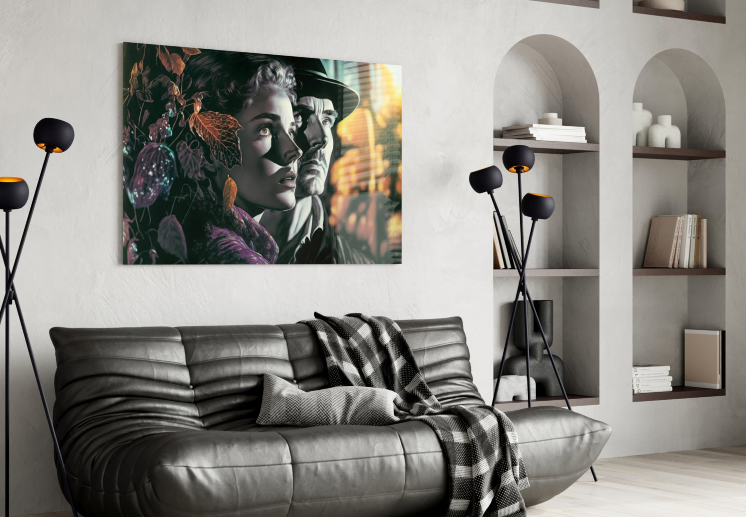 Glass wall art featuring vintage-style portrait of two figures among colorful foliage in purple, green, and gold tones, displayed above black leather sofa.