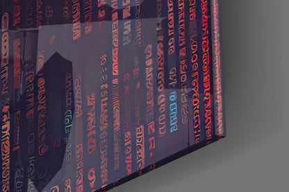 Close-up angled view of translucent glass wall art with red and orange repeated text patterns and cyan accent lettering against gray background.