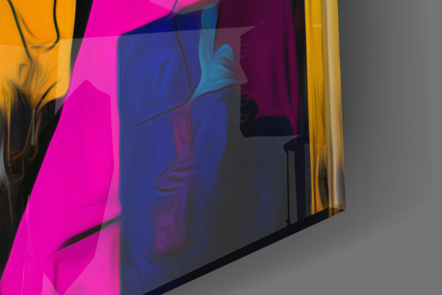 Angled side view of colorful glass wall art panel with magenta, blue, yellow, and black tones depicting abstract human silhouettes.