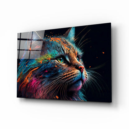 Angled perspective of colorful cat glass wall art with vibrant orange, blue, and pink paint-effect design on black background.