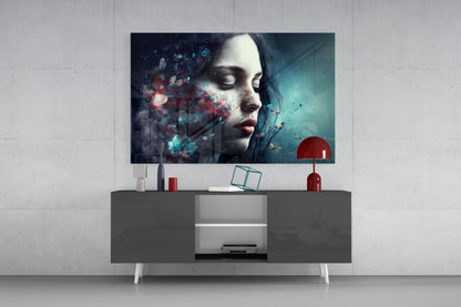 Butterfly Dreams glass wall art displayed above a modern gray media console, showing a woman's profile with colorful butterfly and particle effects against teal and red tones.
