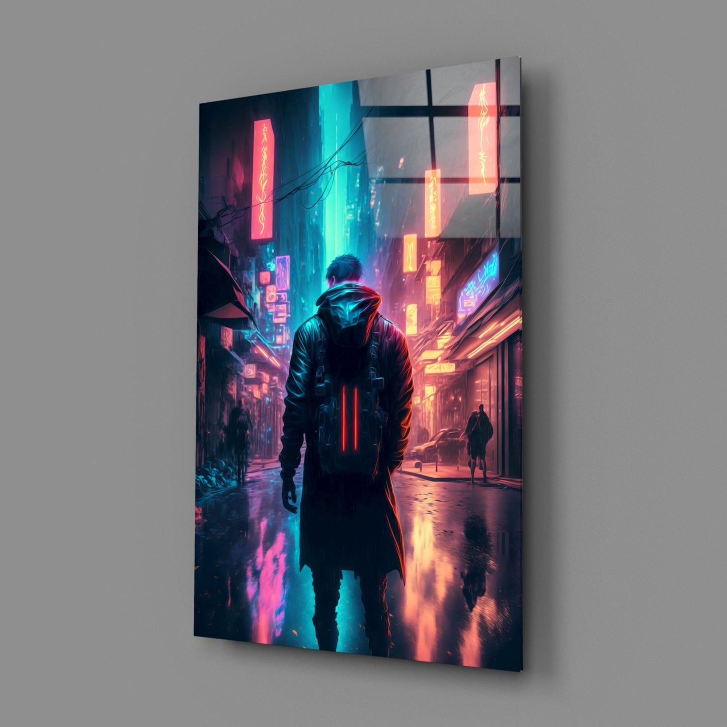 Angled view of glass wall art depicting a hooded figure in a neon-lit cyberpunk street with red and cyan glowing signs and wet pavement reflections.