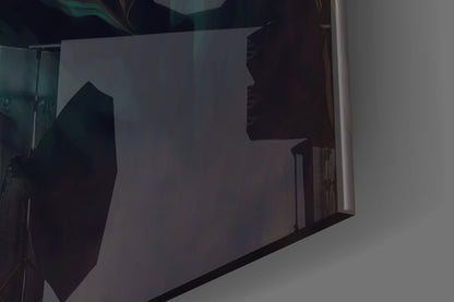 Silhouette of Leonardo da Vinci's profile printed on translucent glass panel with warm lighting from behind.