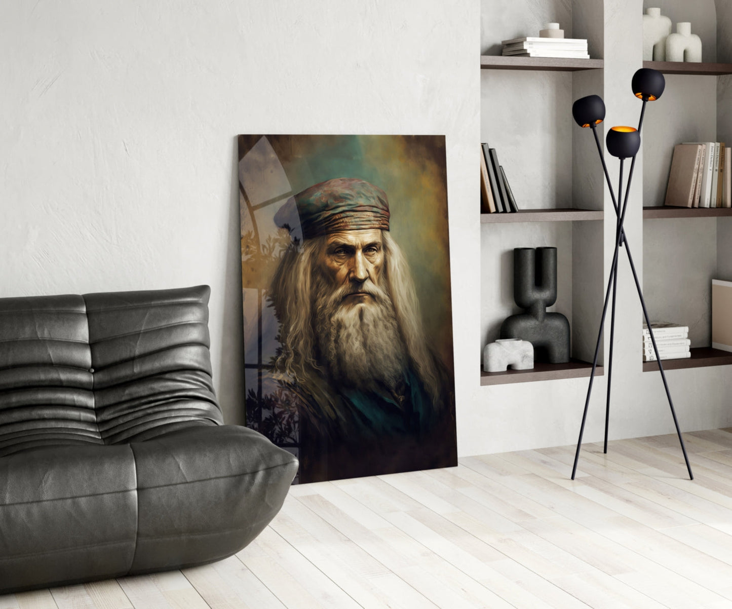 Leonardo da Vinci portrait glass art leaning against white wall in modern living room with gray sofa and shelving.