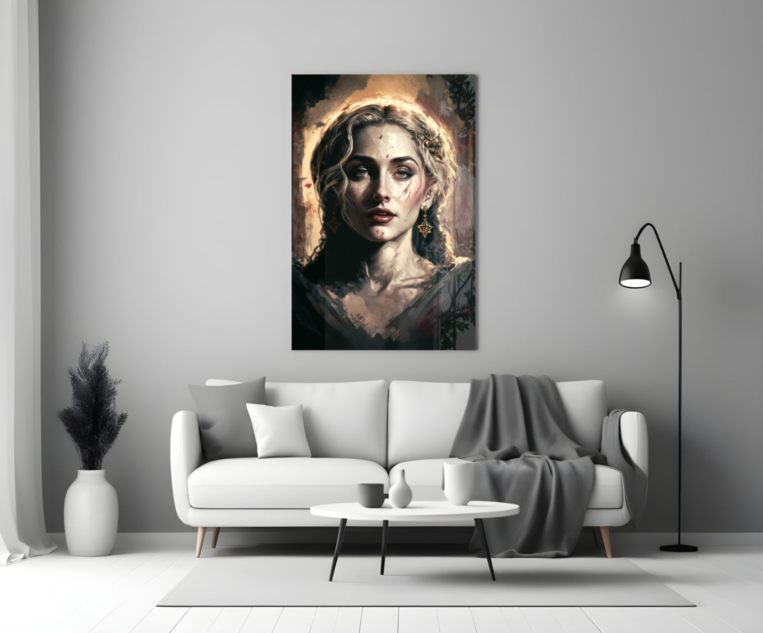 Madonna glass wall art depicting a woman with golden halo and dark wavy hair displayed above white sofa in modern living room.