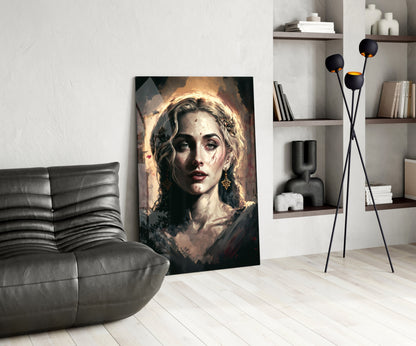 Modern living room featuring a portrait glass wall art of a woman with golden halo and dramatic lighting displayed on white wall.