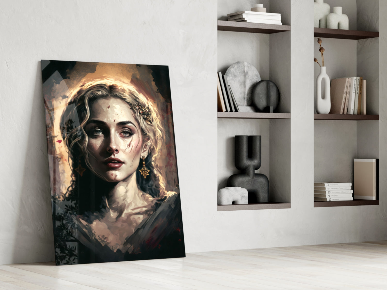 Portrait glass wall art leaning against white wall beside floating shelves with decorative objects and books.