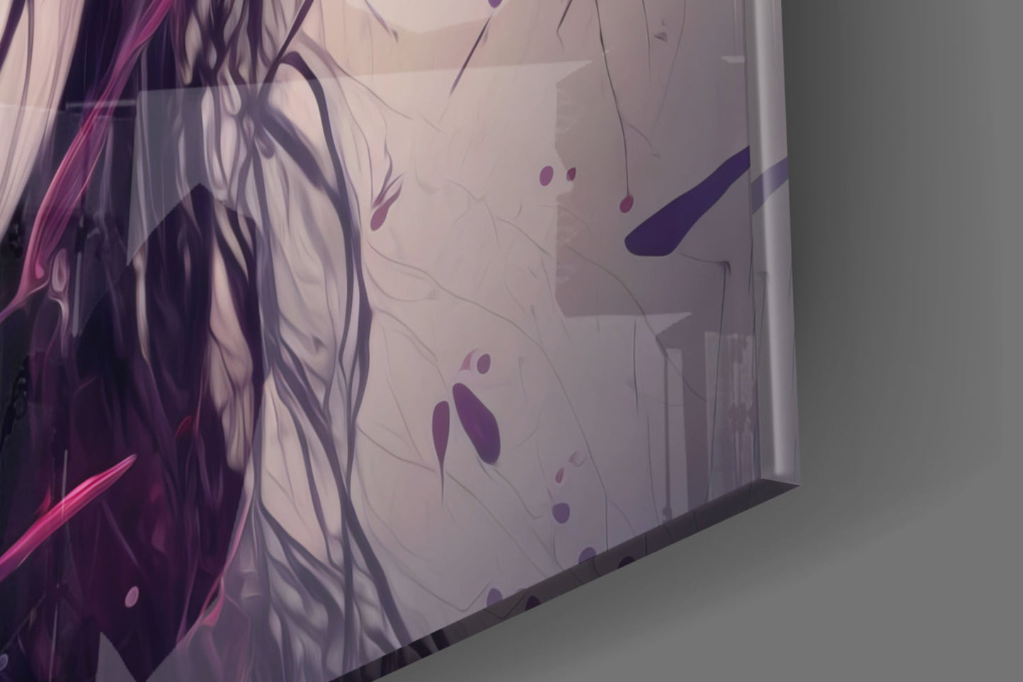 Close-up angled view of glass wall art displaying purple and magenta botanical silhouettes with translucent layering effect.