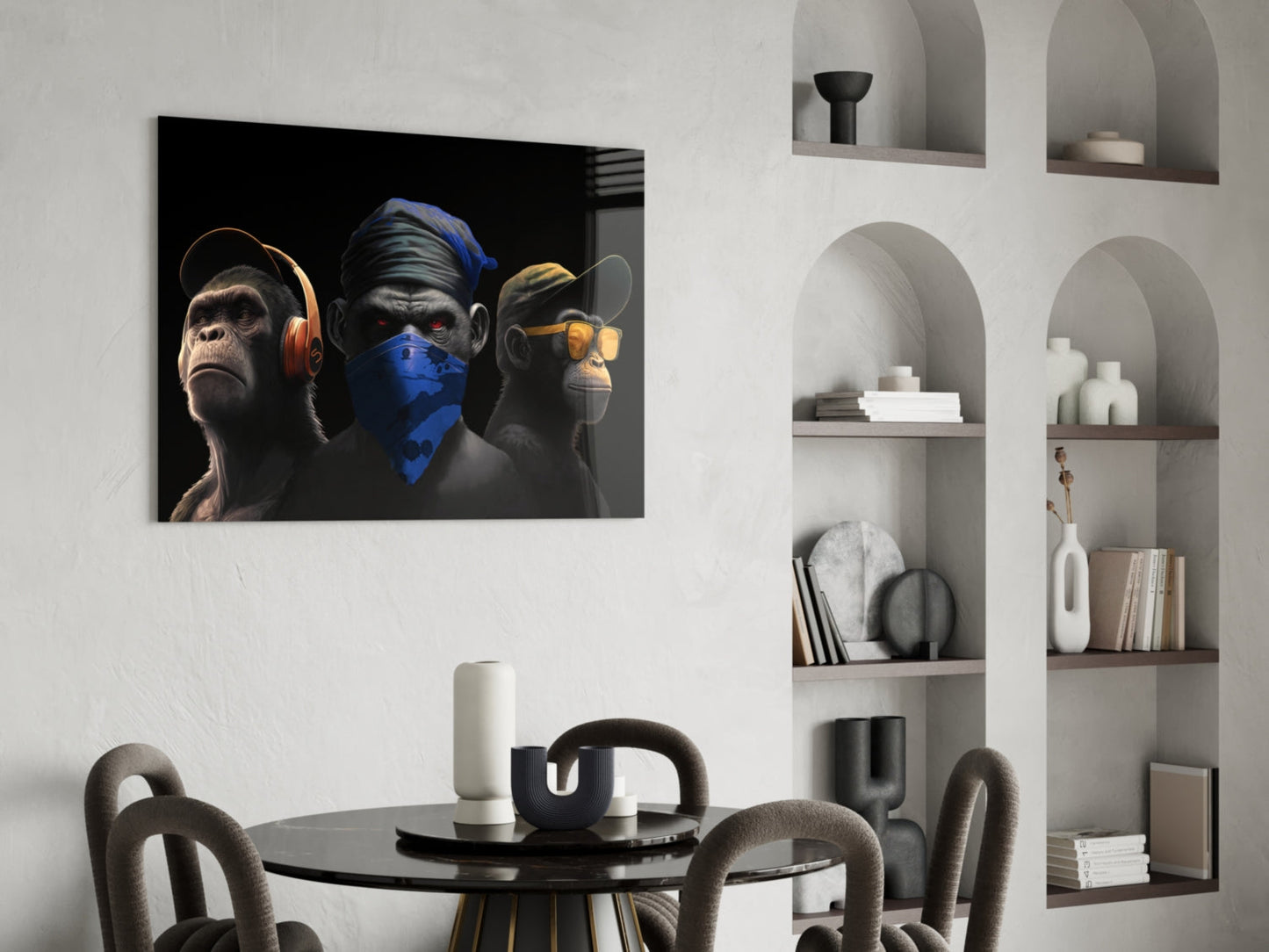 Three stylized monkeys wearing headphones, face mask, and sunglasses displayed on black glass above modern dining table in minimalist interior.