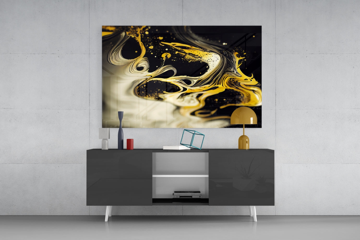 Golden Splash Glass Wall Art hanging above a modern dark media console with white legs and decorative accessories.