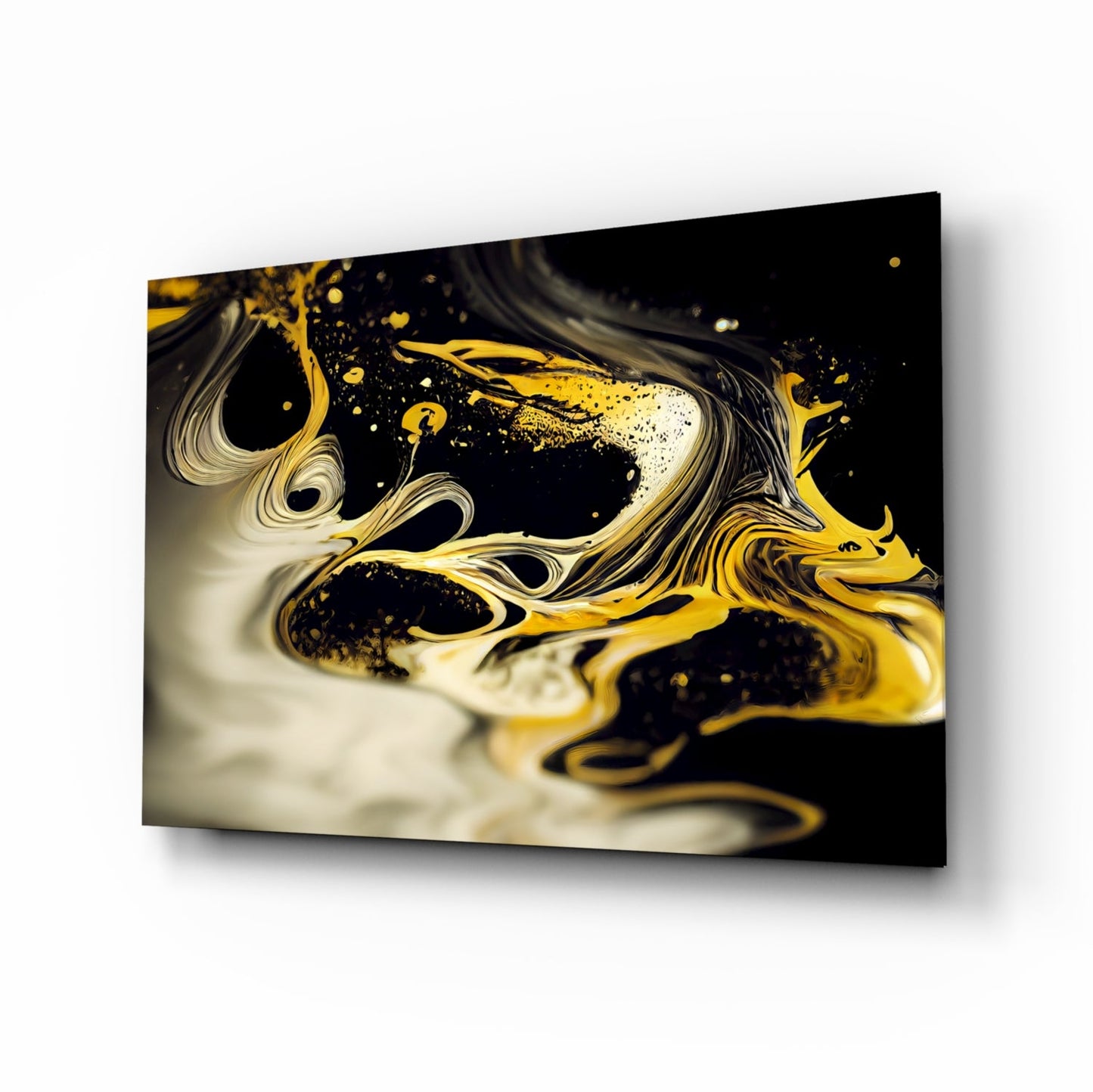 Angled perspective view of glass wall art displaying swirling gold and white patterns with black background and shadow cast on white wall.