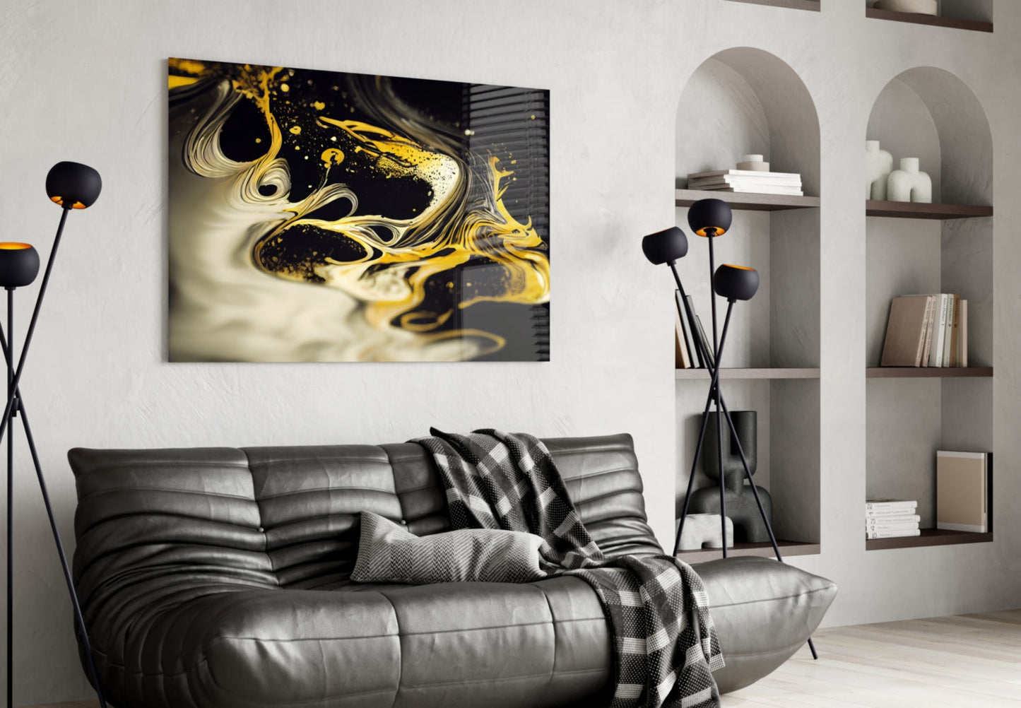 Golden Splash Glass Wall Art displayed above black leather sofa in modern living room with white shelving and black floor lamp.