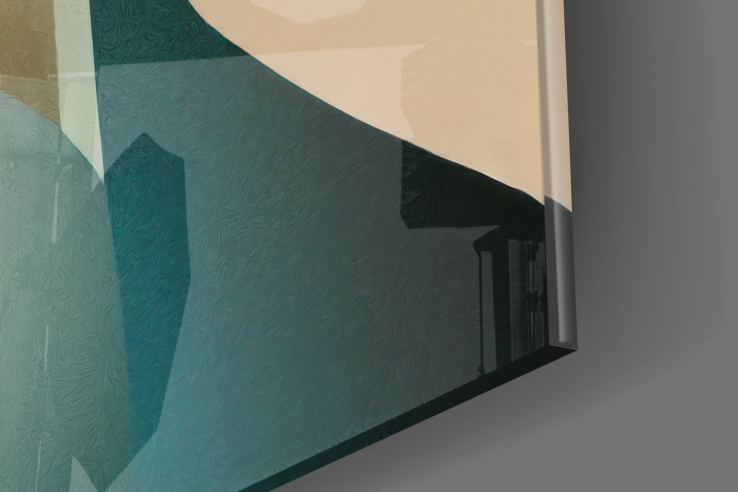 Abstract glass wall art panel with layered teal and cream geometric shapes, displayed at an angle showing depth and shadow.