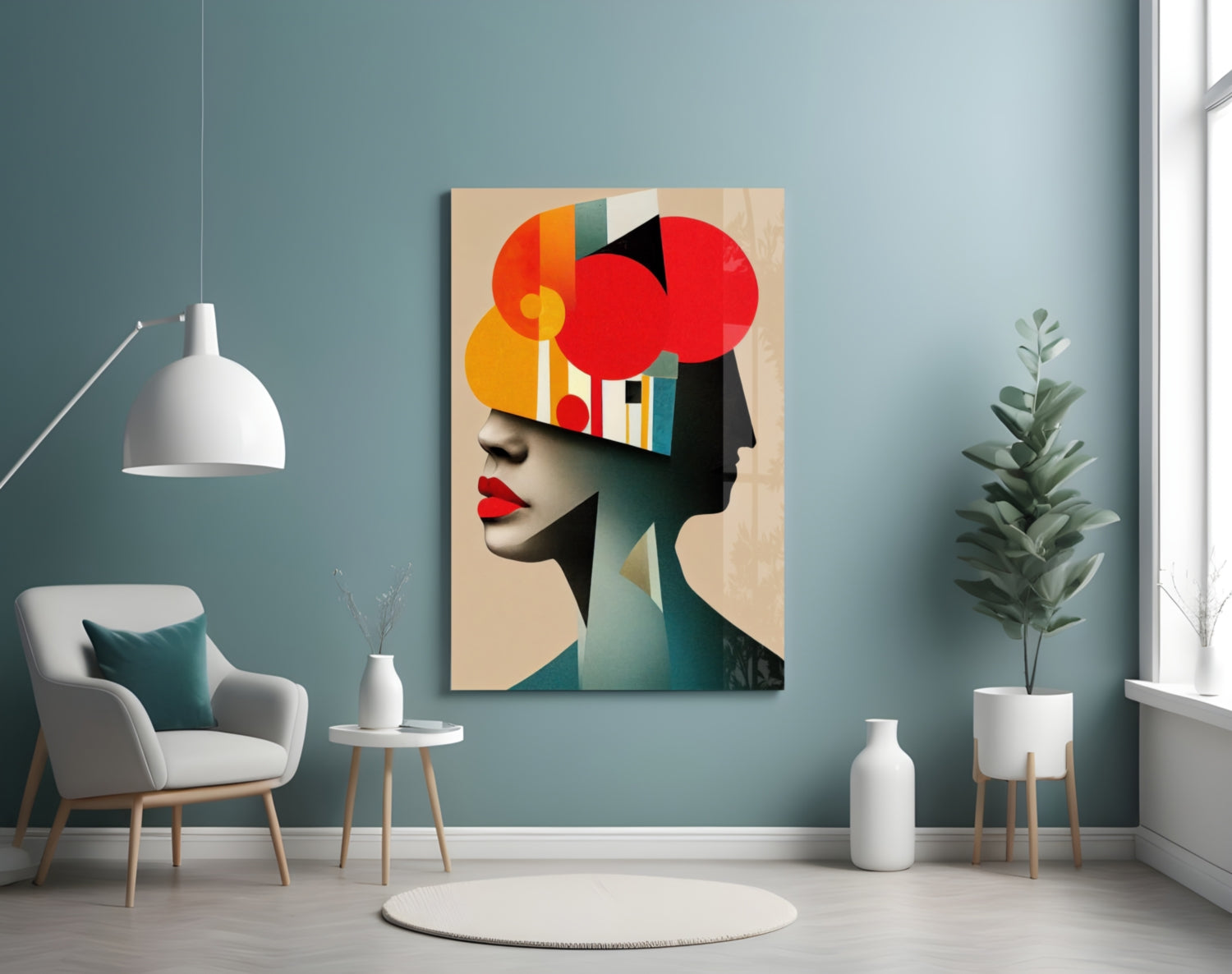 Geometric Thoughts Glass Wall Art displayed in a modern living room with teal walls, white chair, and potted plants, showing colorful abstract head design.