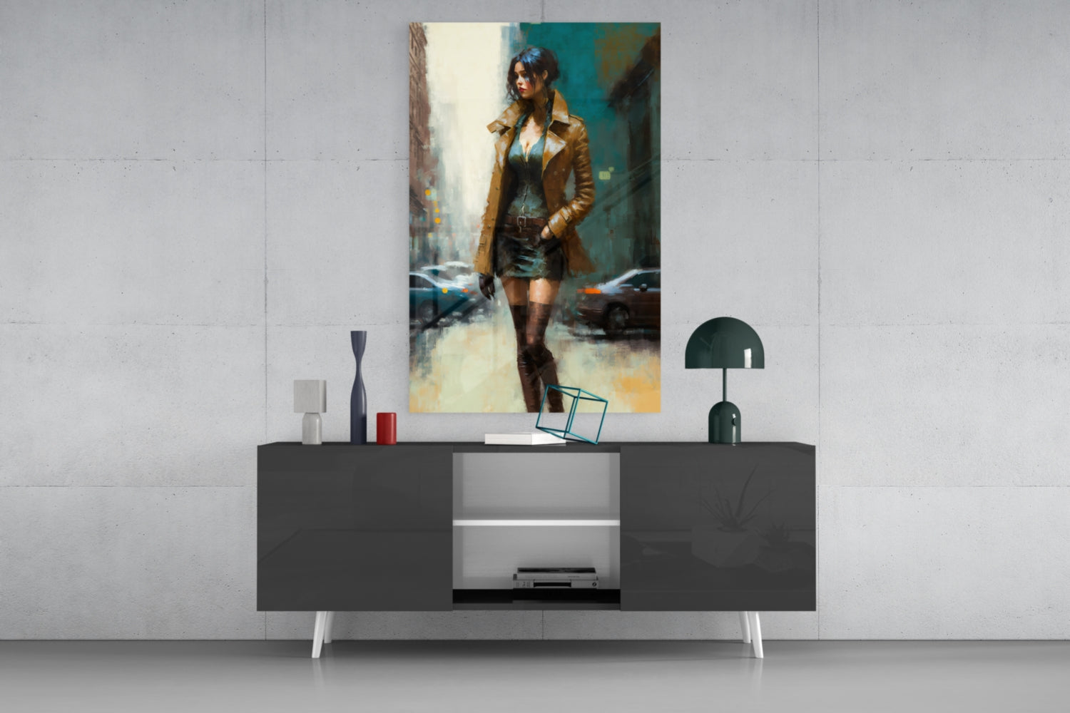 Modern living room display featuring a vertical portrait of a woman in a brown coat hanging above a dark console table with decorative accessories.