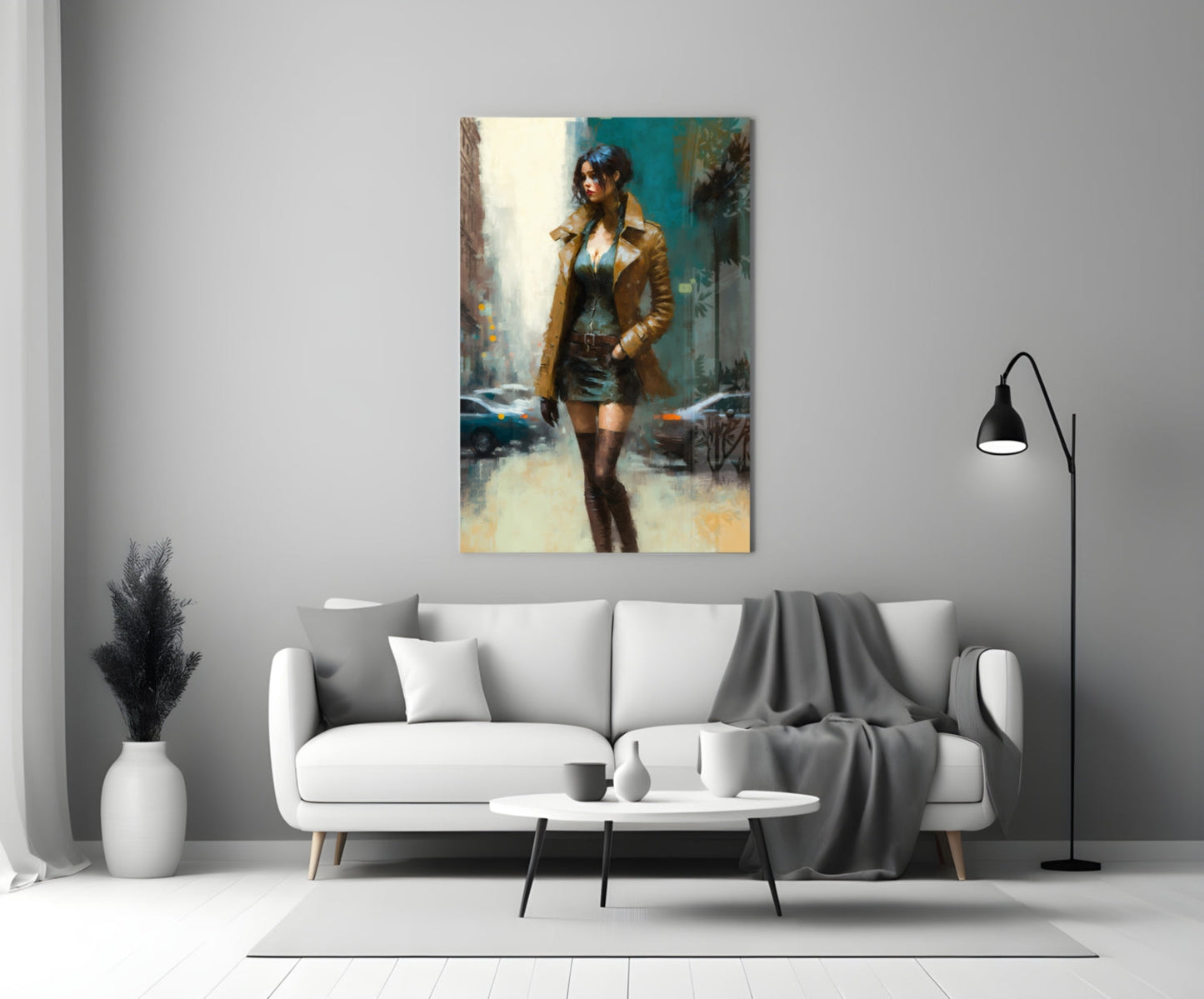 Glass wall art depicting a woman in a tan coat standing on a wet urban street with teal and warm tones, displayed above a white sofa.