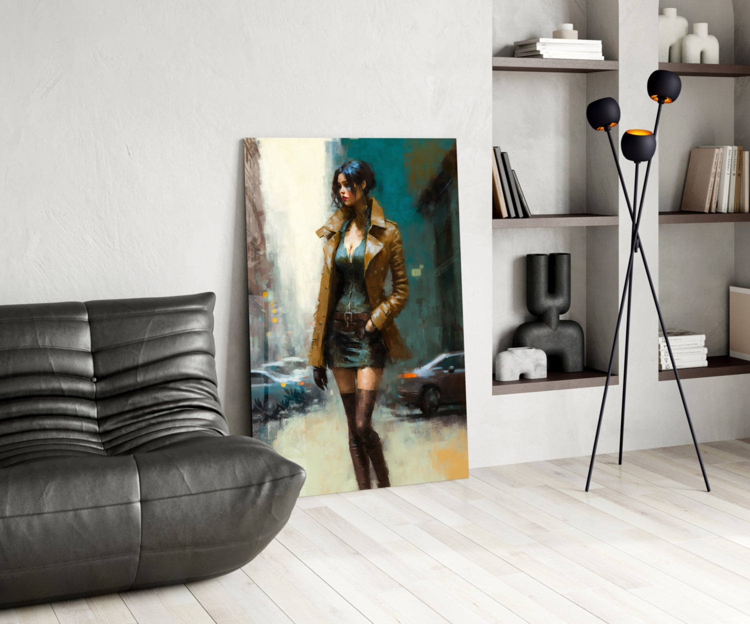 Modern living room with glass wall art depicting a woman in a tan coat against a teal and gold background, displayed next to a black leather chair and floor lamp with spherical shades.