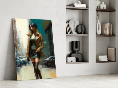 Glass art panel leaning against white wall displays illustrated woman in tan coat against teal and yellow urban background, displayed in modern interior setting.