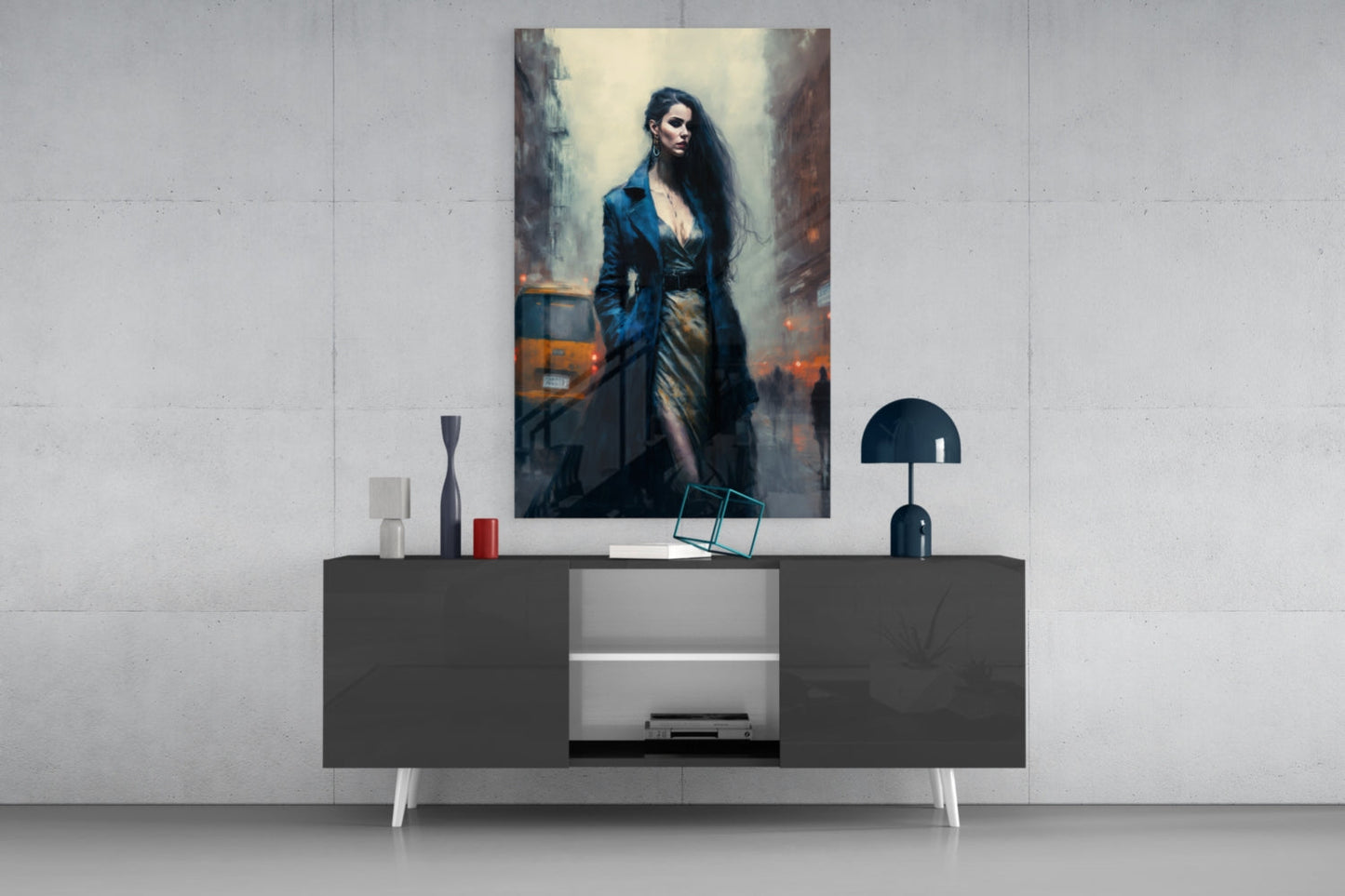 Modern living room display featuring a portrait of a woman in blue coat hanging above a dark console table with decorative accessories and lamp.
