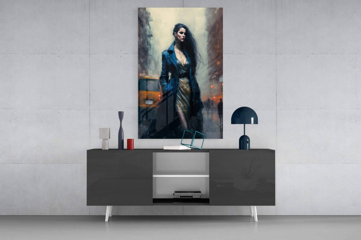 Modern living room display featuring a portrait of a woman in blue coat hanging above a dark console table with decorative accessories and lamp.